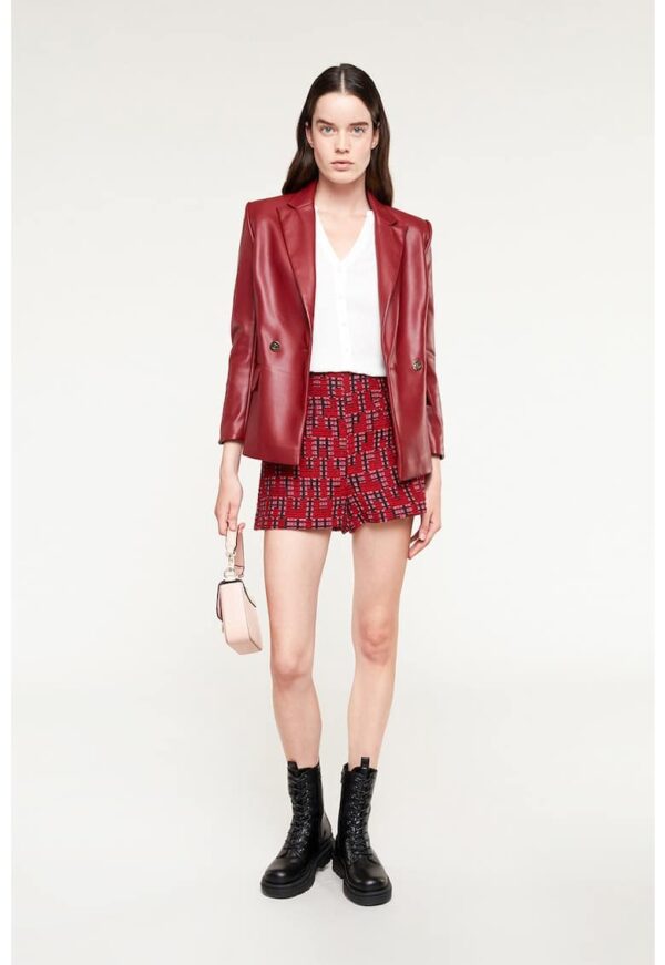 Sacou din piele ecologica cu revere decupate