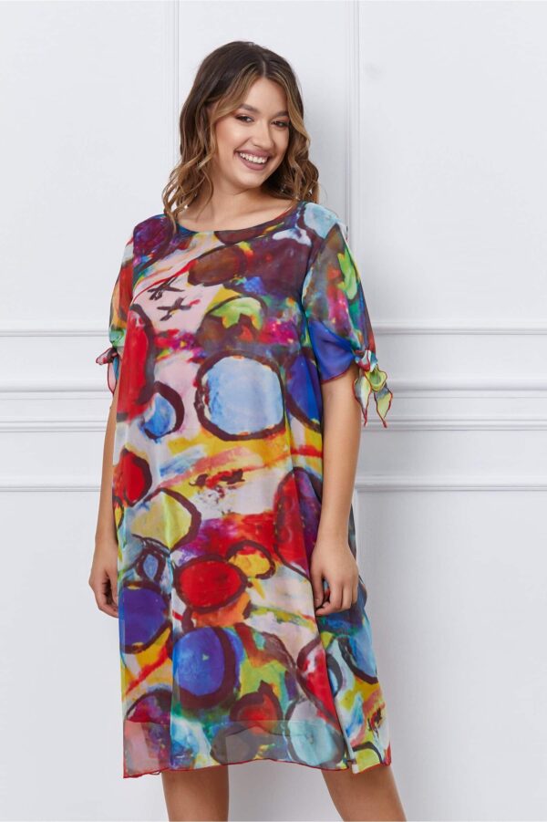 Rochie Bella peach cu imprimeuri si desgin petrecut pe fusta