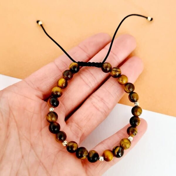 Bratara Conexiune profunda – Pietre Ochi de Tigru – Bilute din Aur 14K – Snur negru rezistent si reglabil