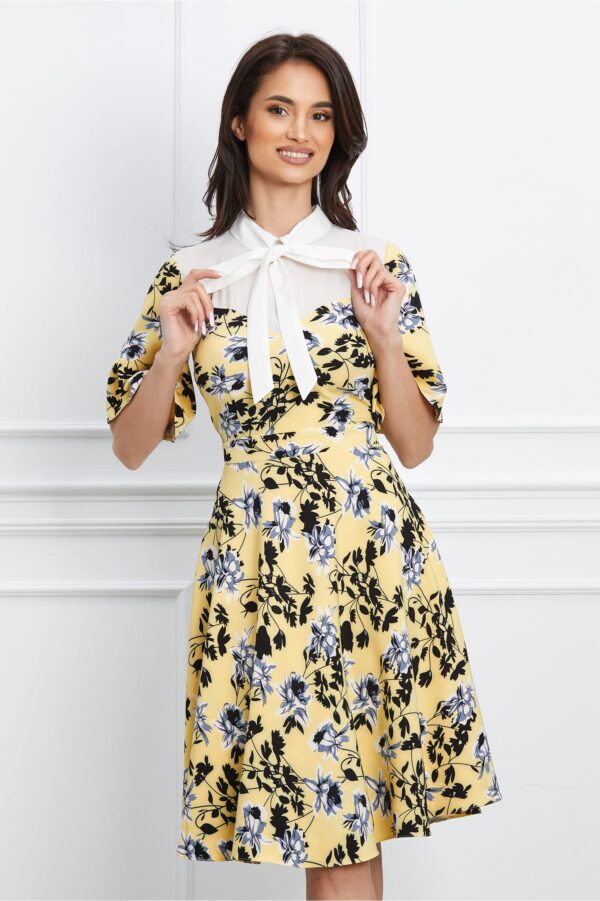 Rochie Dy Fashion galbena cu imprimeu si bust din voal