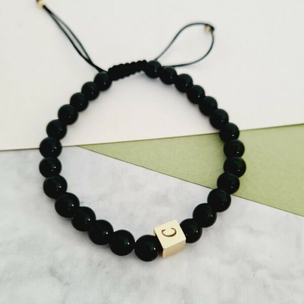 Bratara Golden Cube – Aur Gaben 14K – Pietre Onix – Snur negru reglabil