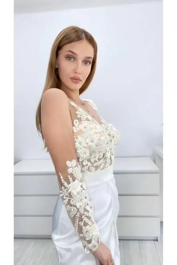 Rochie eleganta midi cu aspect petrecut si broderie pretioasa cu perle