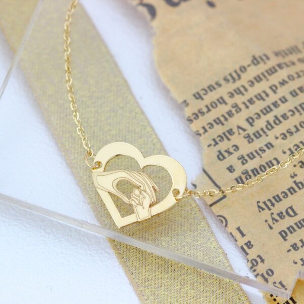 Bratara lant dama cu maini mama si bebe in inima – aur 14K