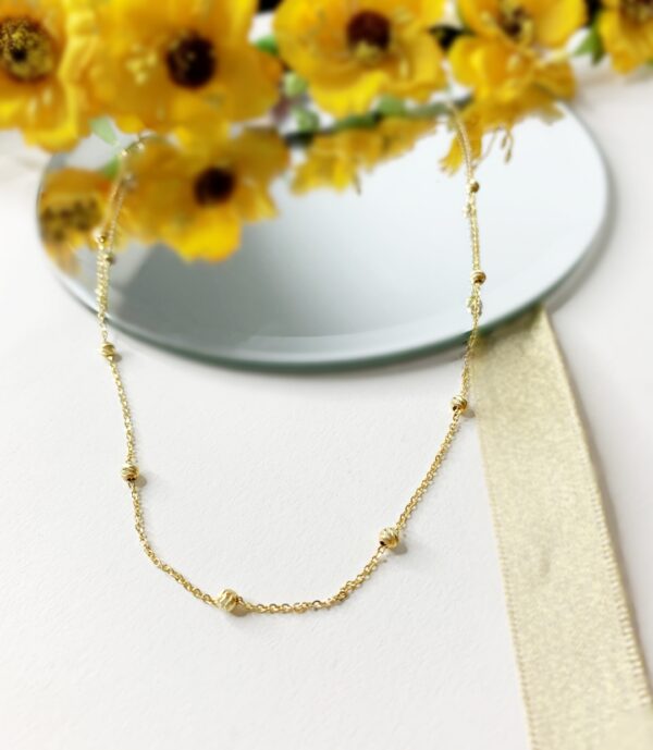 Lantisor cu bilute fixe model diamantat aur galben 14K