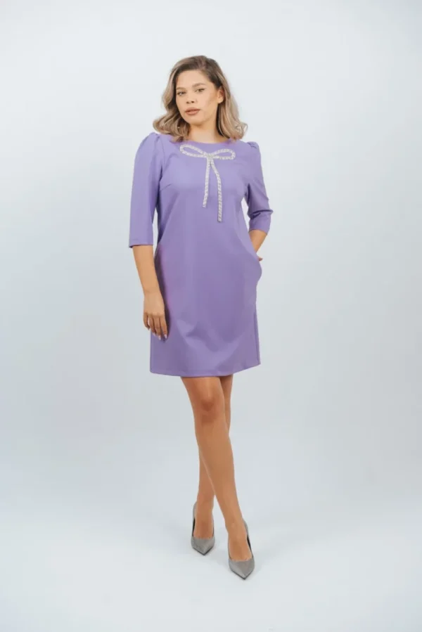 Rochie eleganta cu detalii pretioase in forma de funda la bust